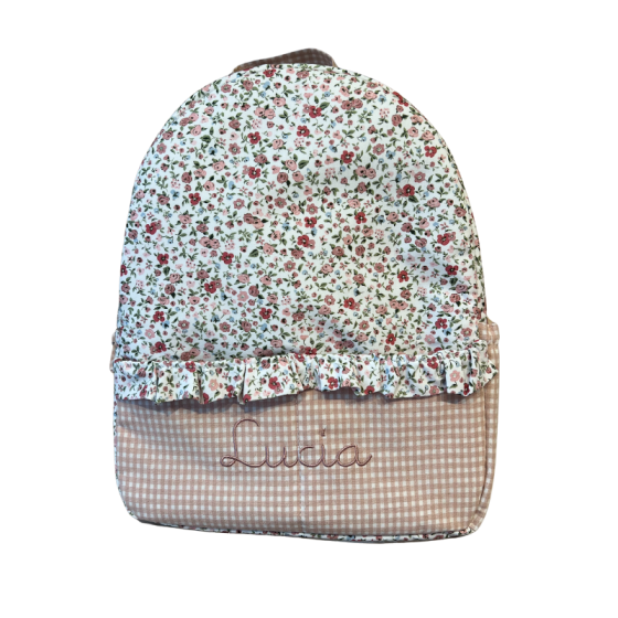 Mochila infantil impermeable con nombre bordado y volante flor Sara